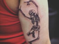 Quirky-And-Fun-Back-of-Arm-Tattoo-Ideas