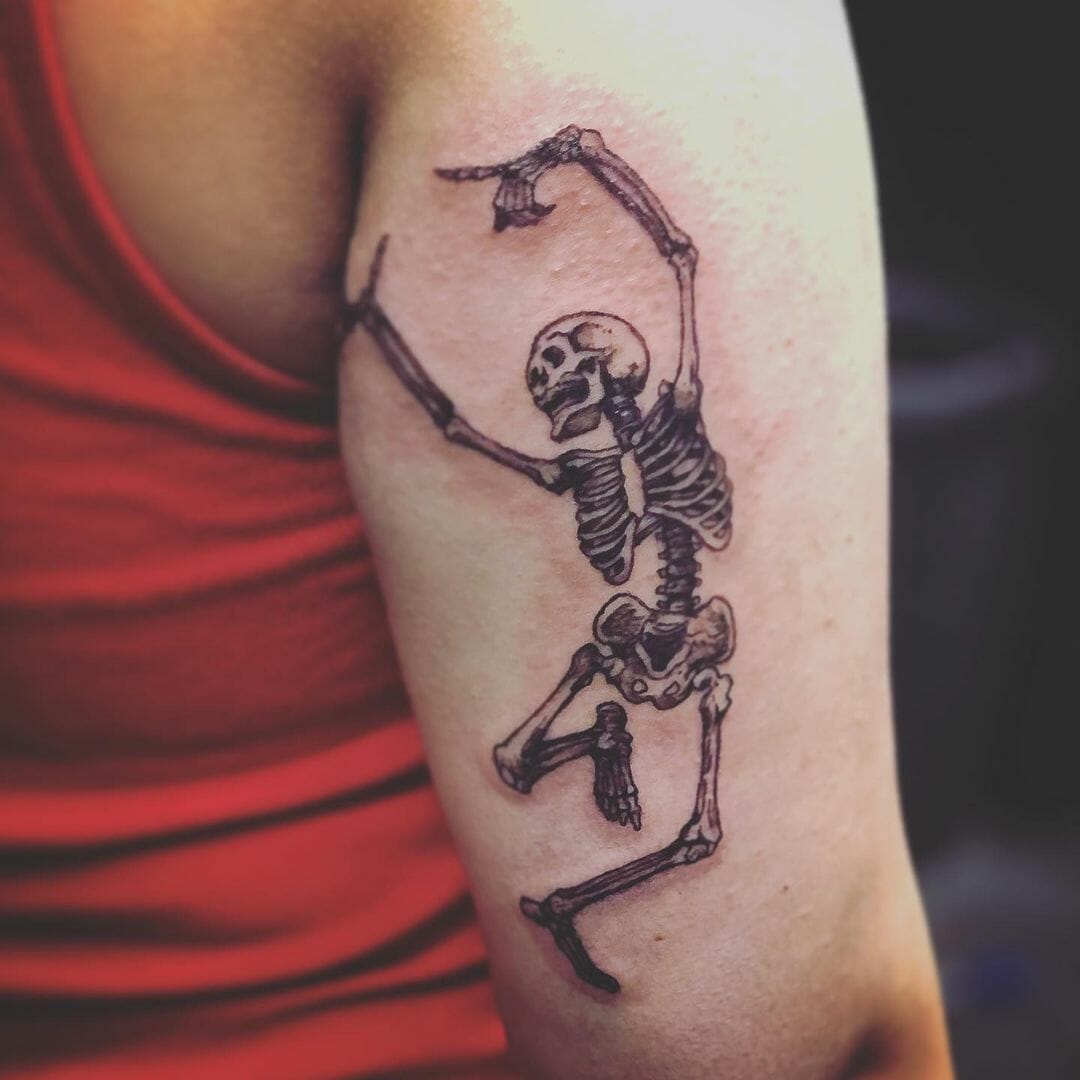 Quirky Back Of Arm Tattoo