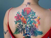 Vibrant-Floral-Back-Tattoo-Idea