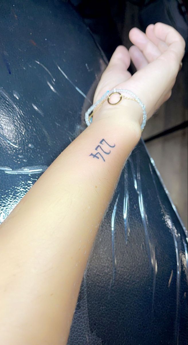Artistic representation of angel number tattoo.