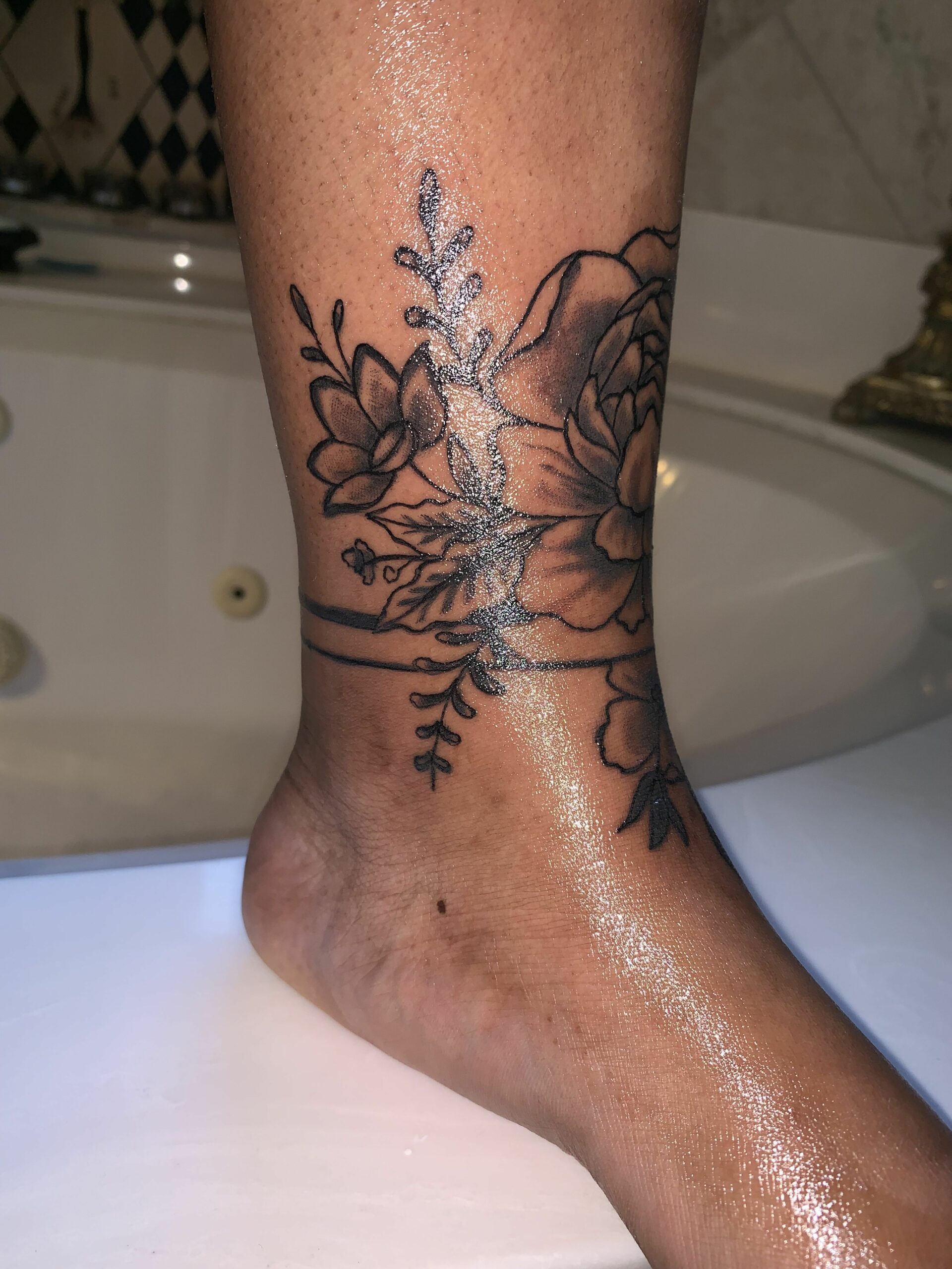 Ankle tattoo design featuring intricate patterns