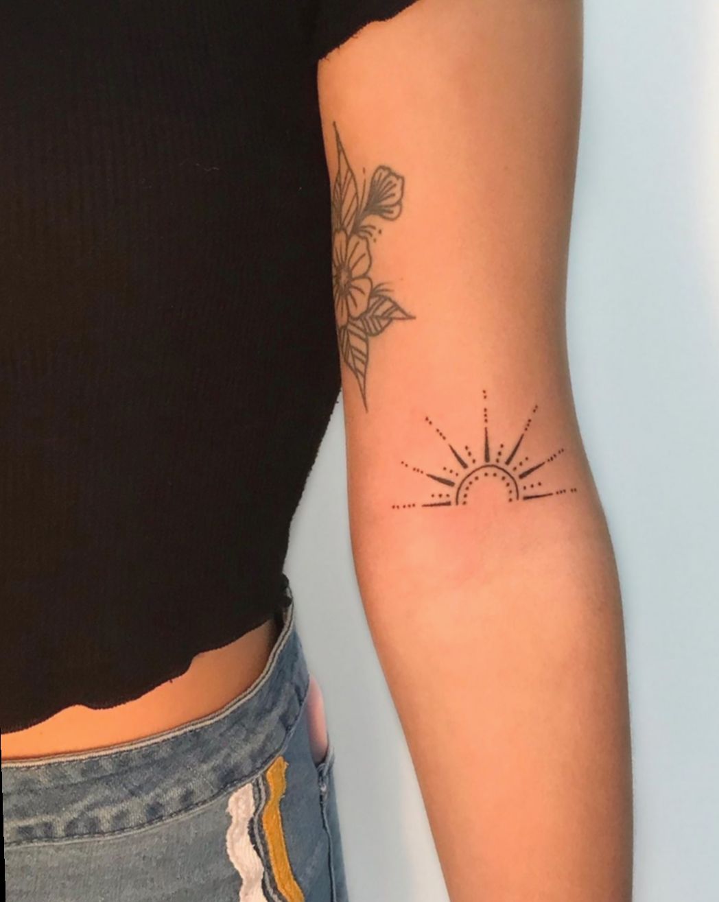 Tattoo Behind Arm Above Elbow