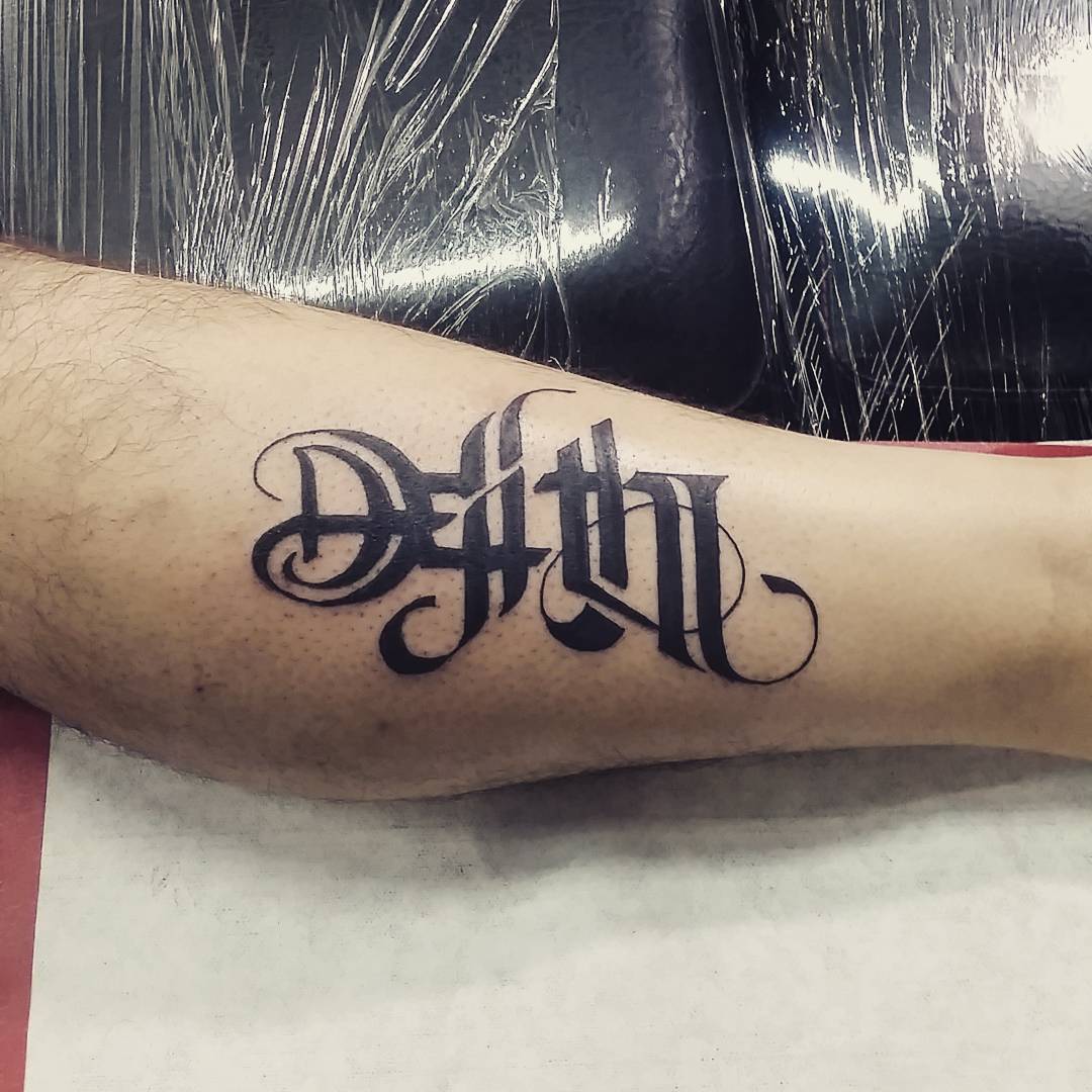 Ambigram tattoo of peace and war