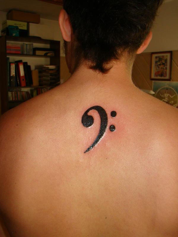 Artistic bass clef tattoo by gabrielle-1985