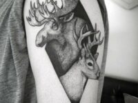 black-ink-dotwork-upper-arm-guys-moose-tattoos