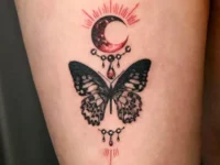 butterfly-thigh-tattoo-by-@tattooist_danha.jpg