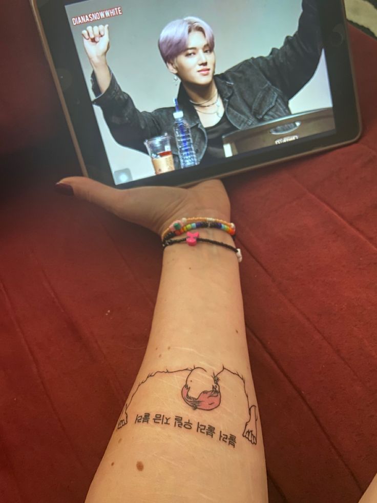 Ateez Wooyoung's tattoo in 2022
