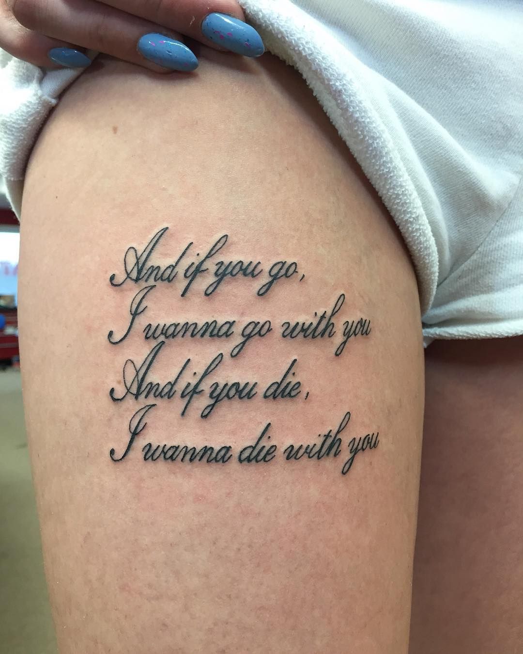 A thigh tattoo showcasing the phrase, 'and if you go I wanna to'.