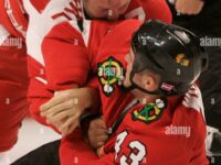 detroit-red-wings-dallas-drake-top-tackles-chicago-blackhawks-james-wisniewski-while-fighting-during-the-first-period-of-a-hockey-game-saturday-oct-6-2007-in-chicago-ap-photojerry-lai-2PB1A4W