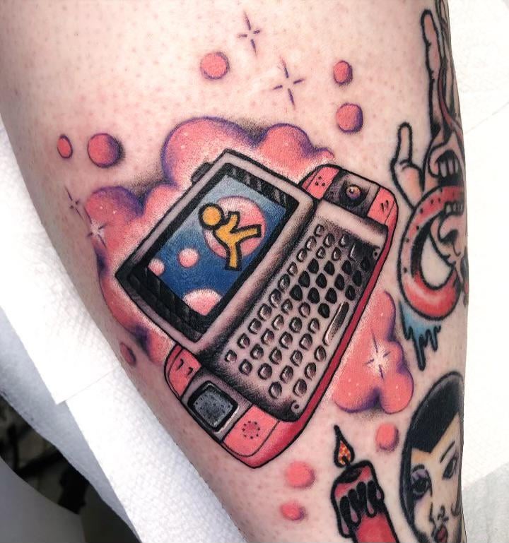 Early 2000s Sidekick Tattoo