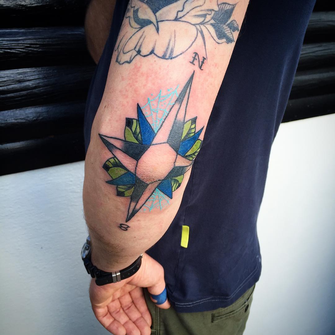 Elegant Floral Design for Elbow Tattoo