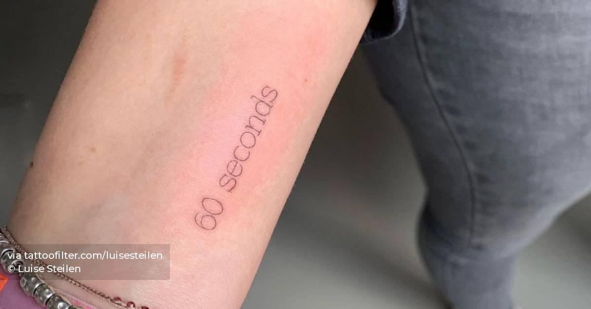 60 seconds lettering tattoo on the wrist