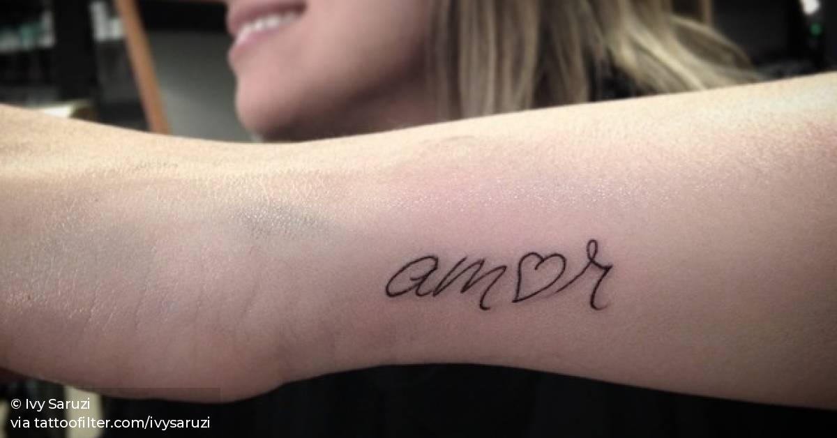 Wrist tattoo saying 'Amor'