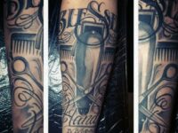 half-sleeve-barbershop-tattoo-with-clippers-and-scissors-for-men