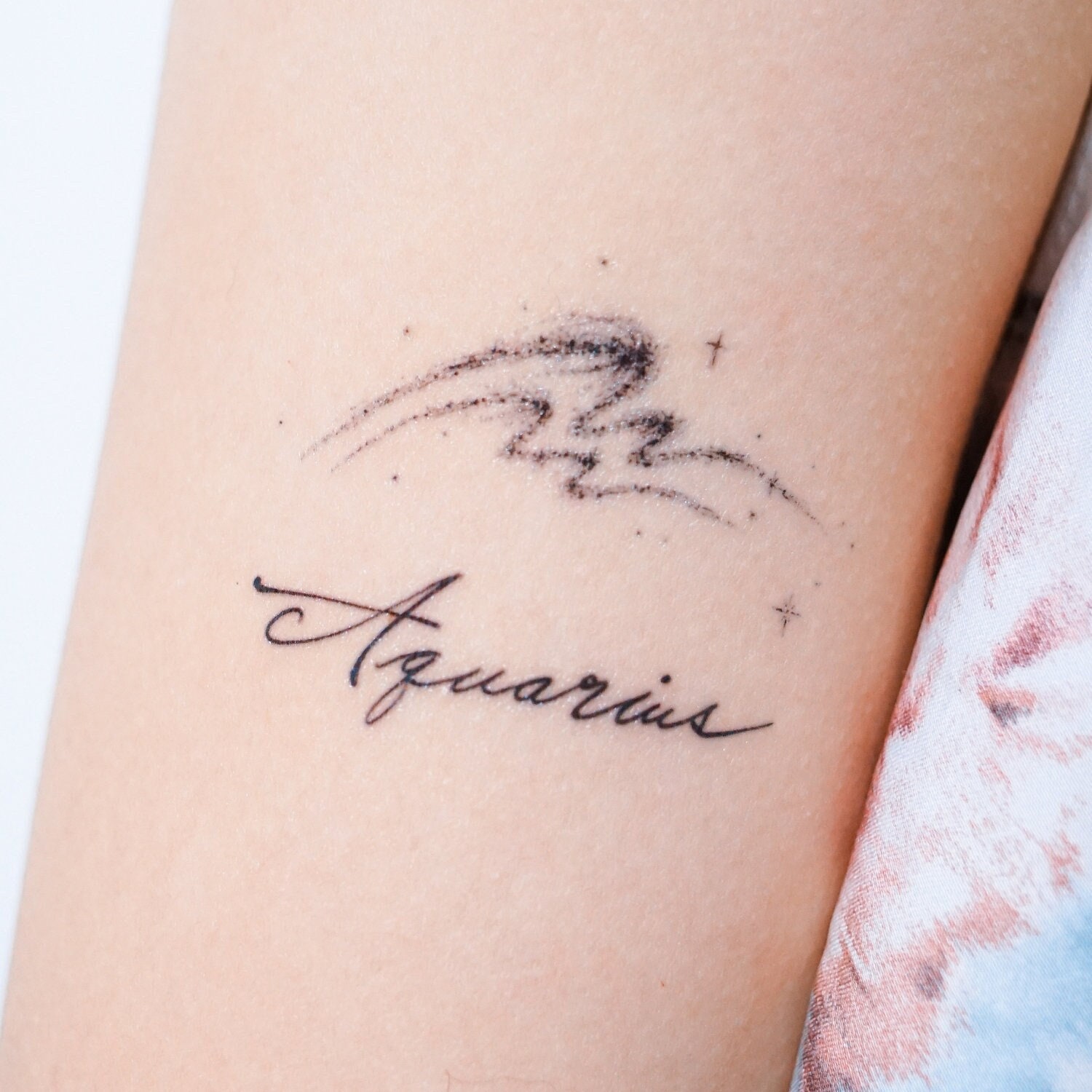 Water Bearer Aquarius Tattoo