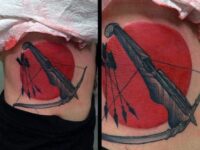 incredible-red-bow-and-arrow-mens-archery-tattoo-design-on-lower-rib-cage-side