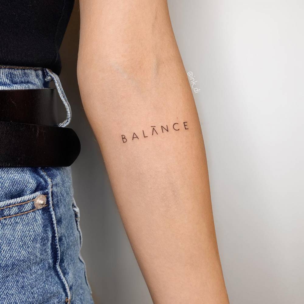 A balance tattoo represented with unique elements