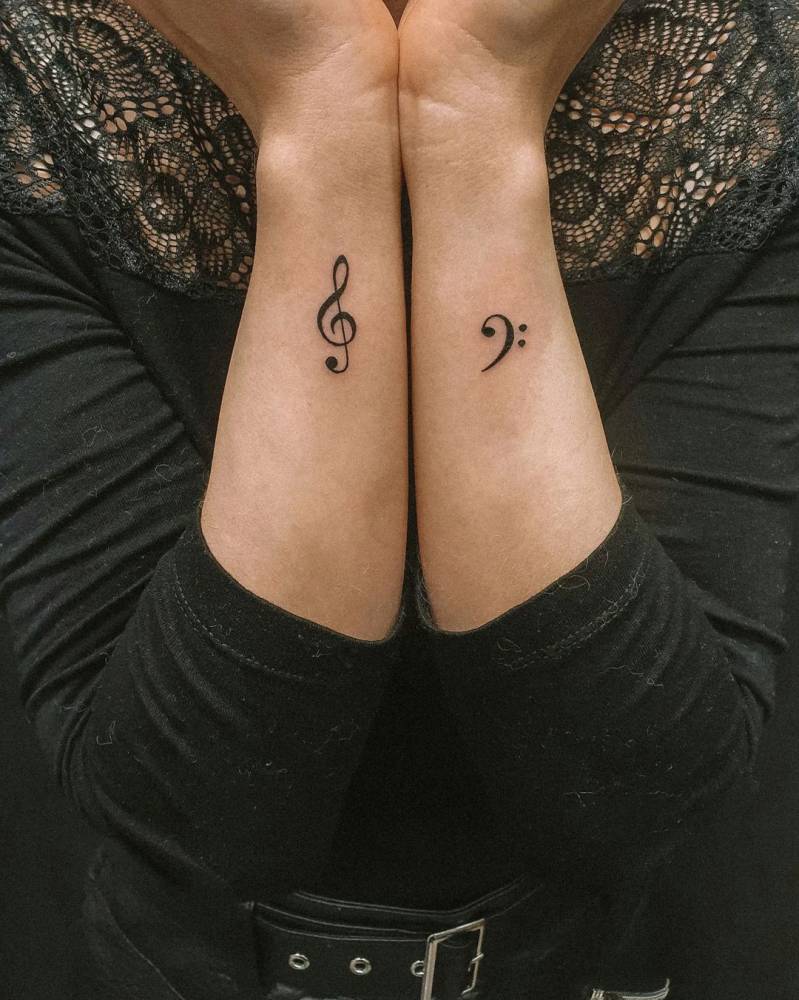 Treble clef and bass clef tattoo combination