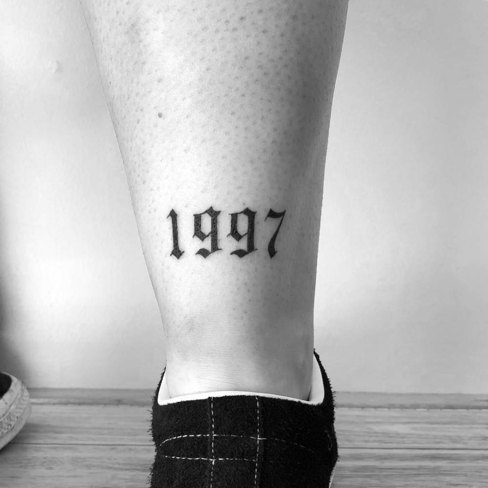 Symbolic 1997 Tattoo Design