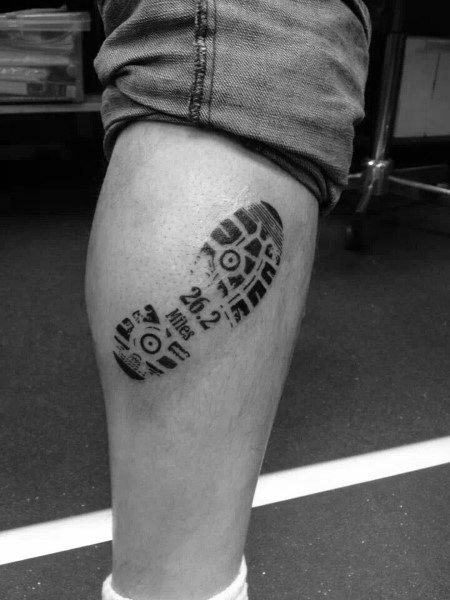 Leg and calf shoe print tattoo design