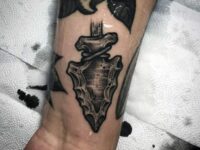 male-wrist-leaden-arrowhead-tattoo