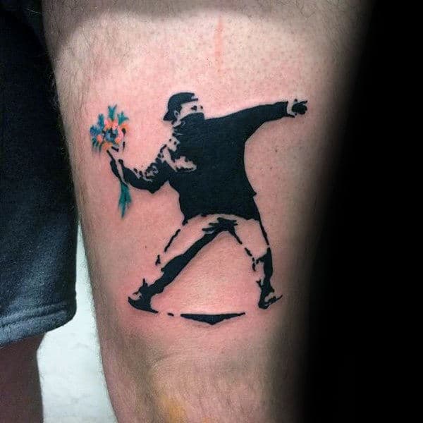 Banksy Thigh Tattoo