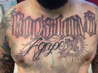 ornate-script-lettering-agape-cross-mens-chest-tattoo