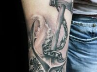 realistic-anchor-with-ocean-wave-guys-inner-forearm-tattoo