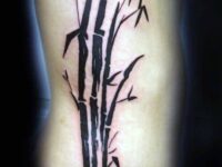 ribs-male-black-ink-bamboo-tattoo-designs