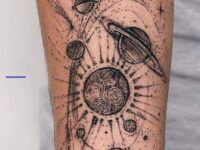 solar-planets-astronomy-tattoo-idea-on-forearm