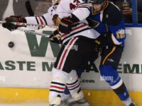 st-louis-blues-lee-stempnick-right-fights-for-the-puck-with-chicago-blackhawks-james-wisniewski-43-in-the-second-period-in-an-nhl-hockey-game-saturday-nov-3-2007-in-st-louis-ap-photobill-boyce-2PAX7B7