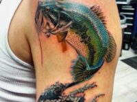 stylish-jumping-bass-tattoo-on-male-bicep