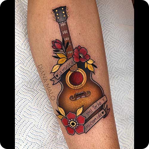 Traditional acoustic guitar tattoo