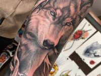 wolf-face-tattoo-in-arm-by-artist-vinko.ink_
